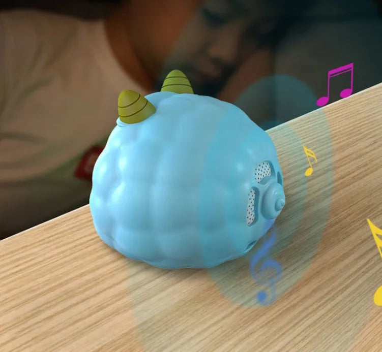 Smart alarm clock with voice control, motion sensor, and luminous display in silicone construction