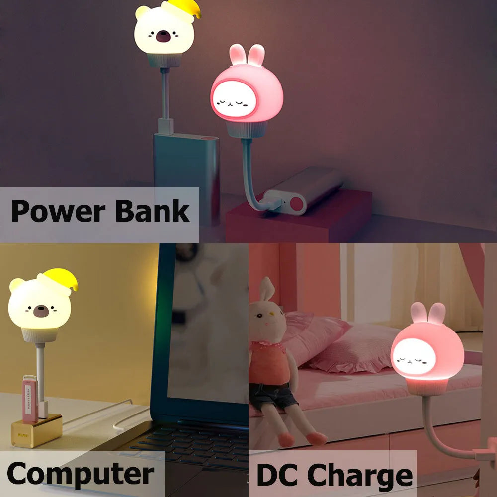 Cute cartoon animal USB night light in bear shape with soft white glow on a bedside table.