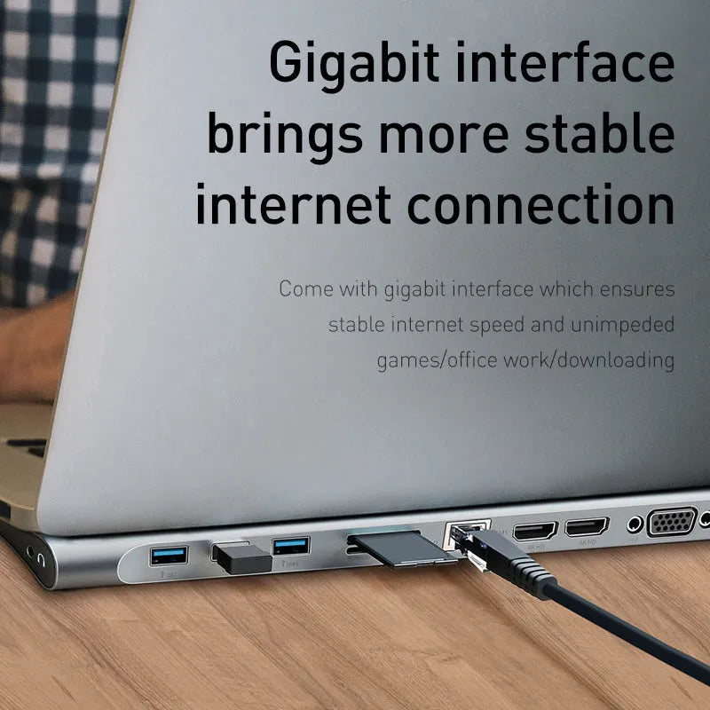 Grey aluminium USB C hub docking station with cooling bracket showing ten ports including HDMI and Ethernet