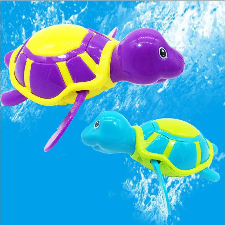 Plastic swimming turtle baby bath toy floating in water for aquatic play