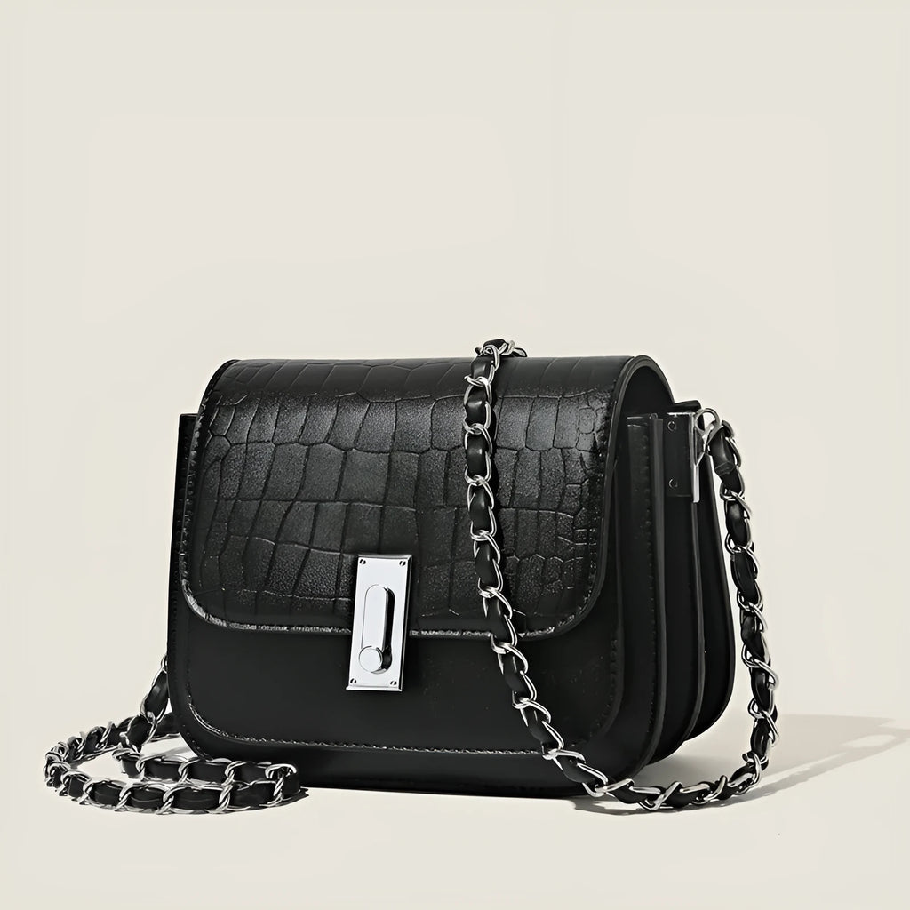 Women's soft black PU leather chain shoulder bag with a square shape and sandwich pocket.
