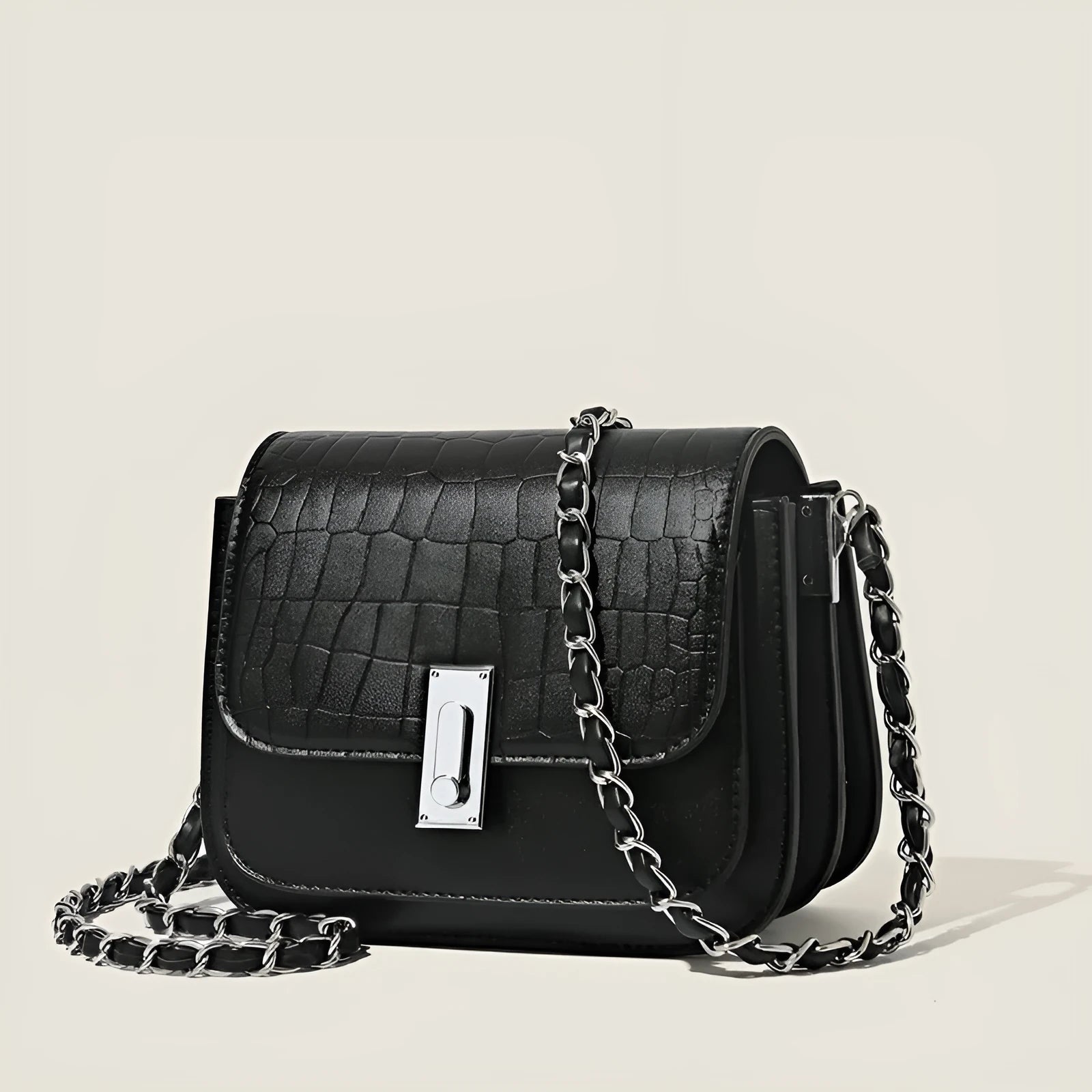 Women's soft black PU leather chain shoulder bag with a square shape and sandwich pocket.
