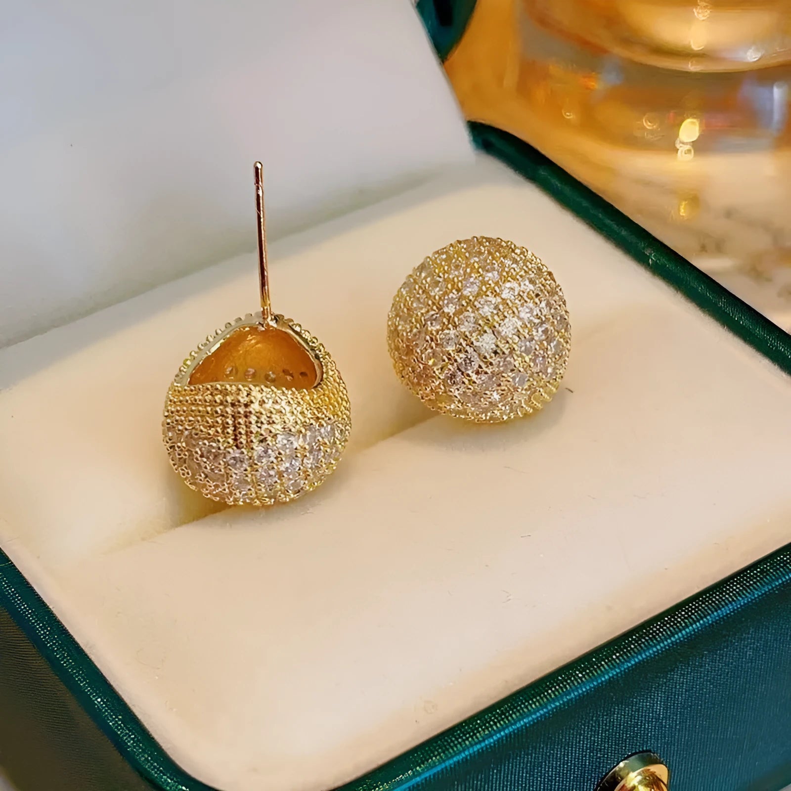 Women's geometric drop earrings with full diamond golden beans design in gold and white colour options