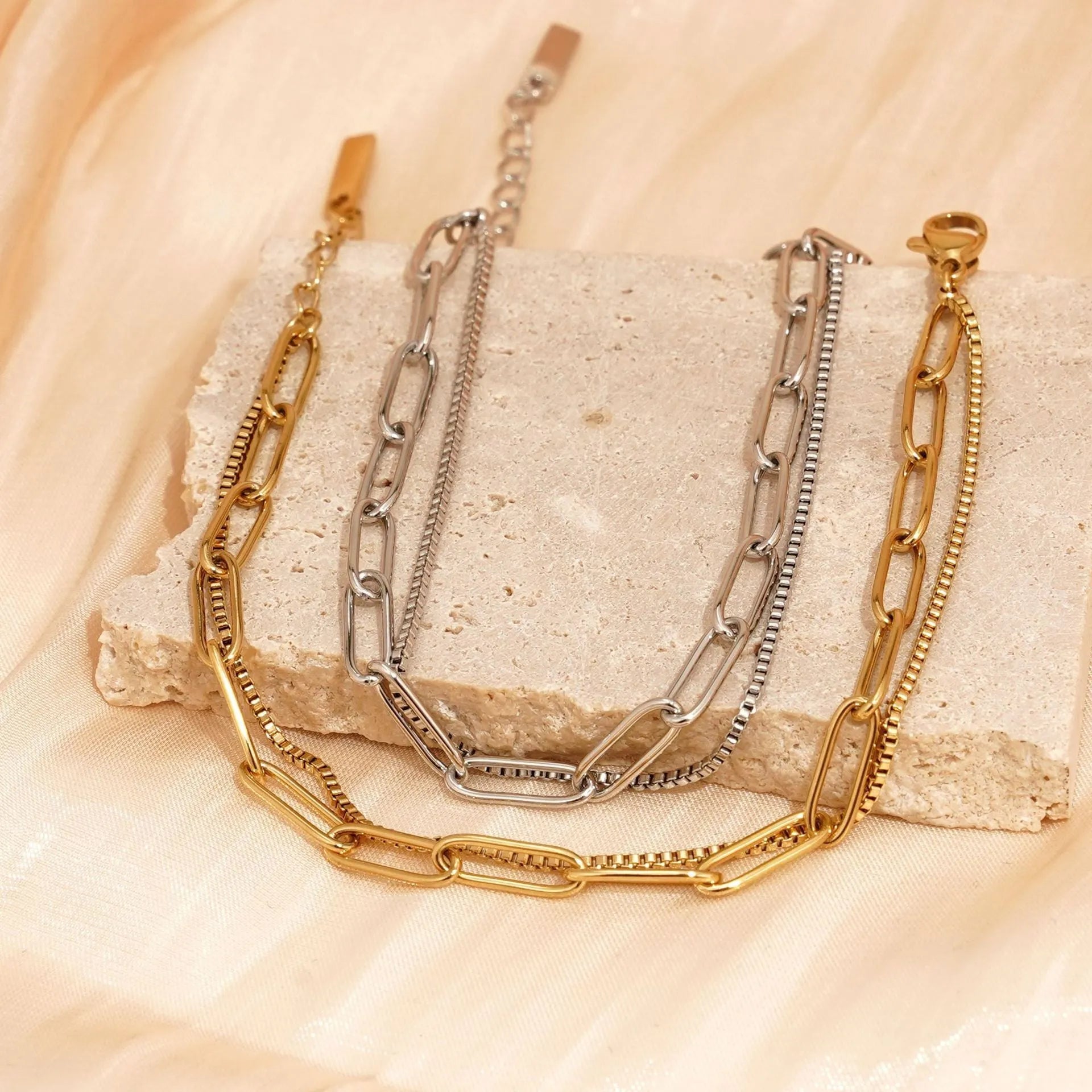 Women's double layer titanium steel bracelet with geometric lines in gold or silver electroplate
