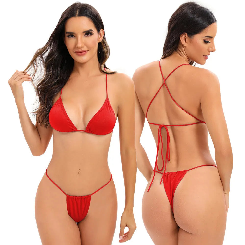 Women's candy coloured milk silk bikini with cross straps, shown in a brief style.