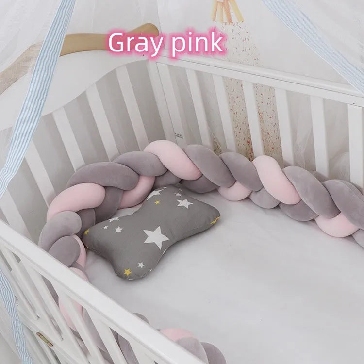 Spandex crystal velvet baby cot bumper in grey pink colour, shown flexible and long.
