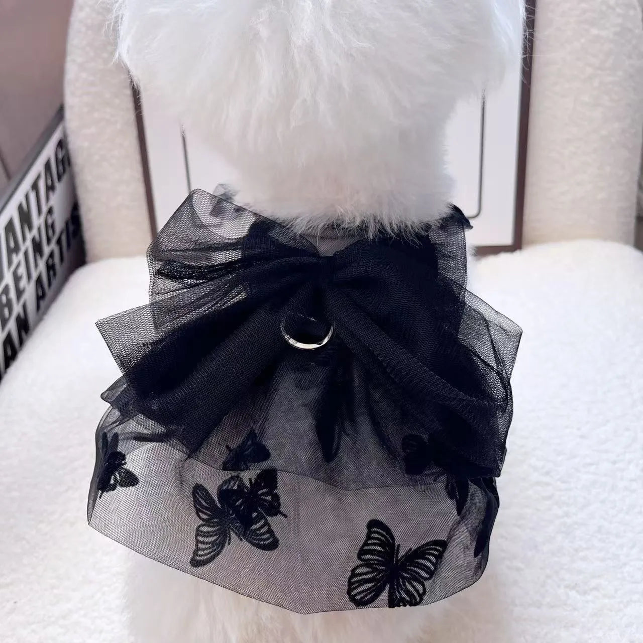Black gauze princess tulle skirt for a small dog or cat on a mannequin.