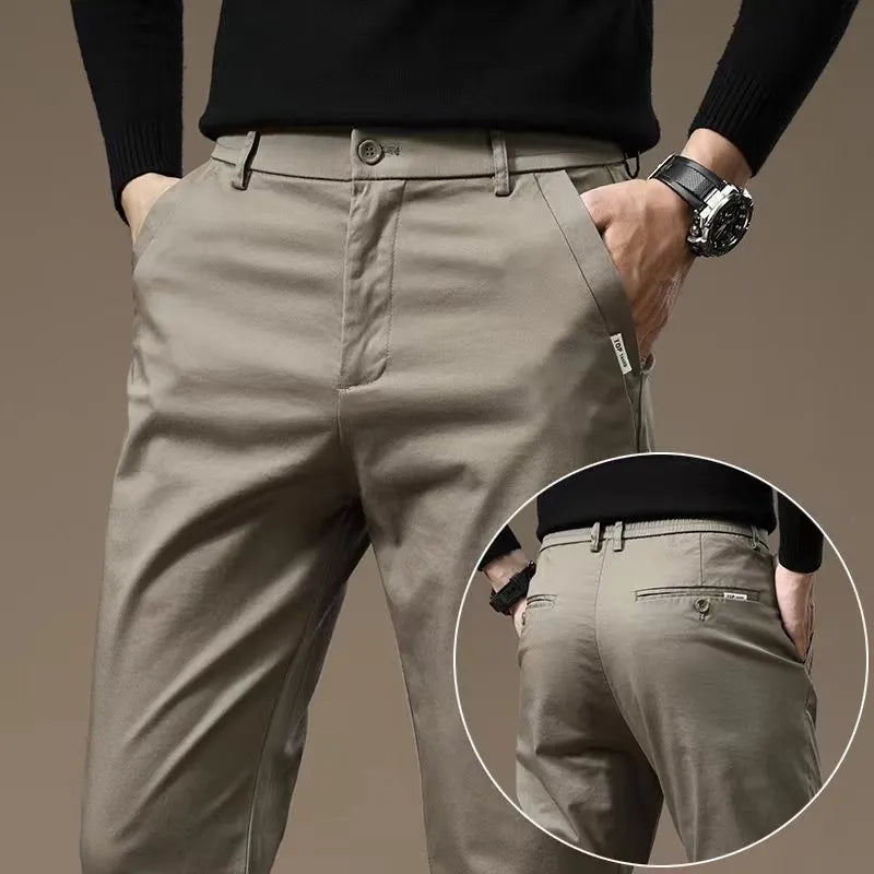 Men combed cotton light business casual trousers in black, side view showing mid-waist cut and fabric texture