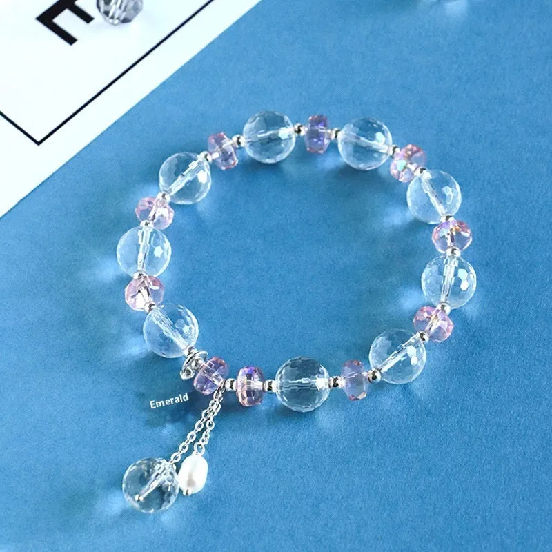 White crystal XINGX bracelet with lucky cat charm and diamond-shaped crystals in Korean style design