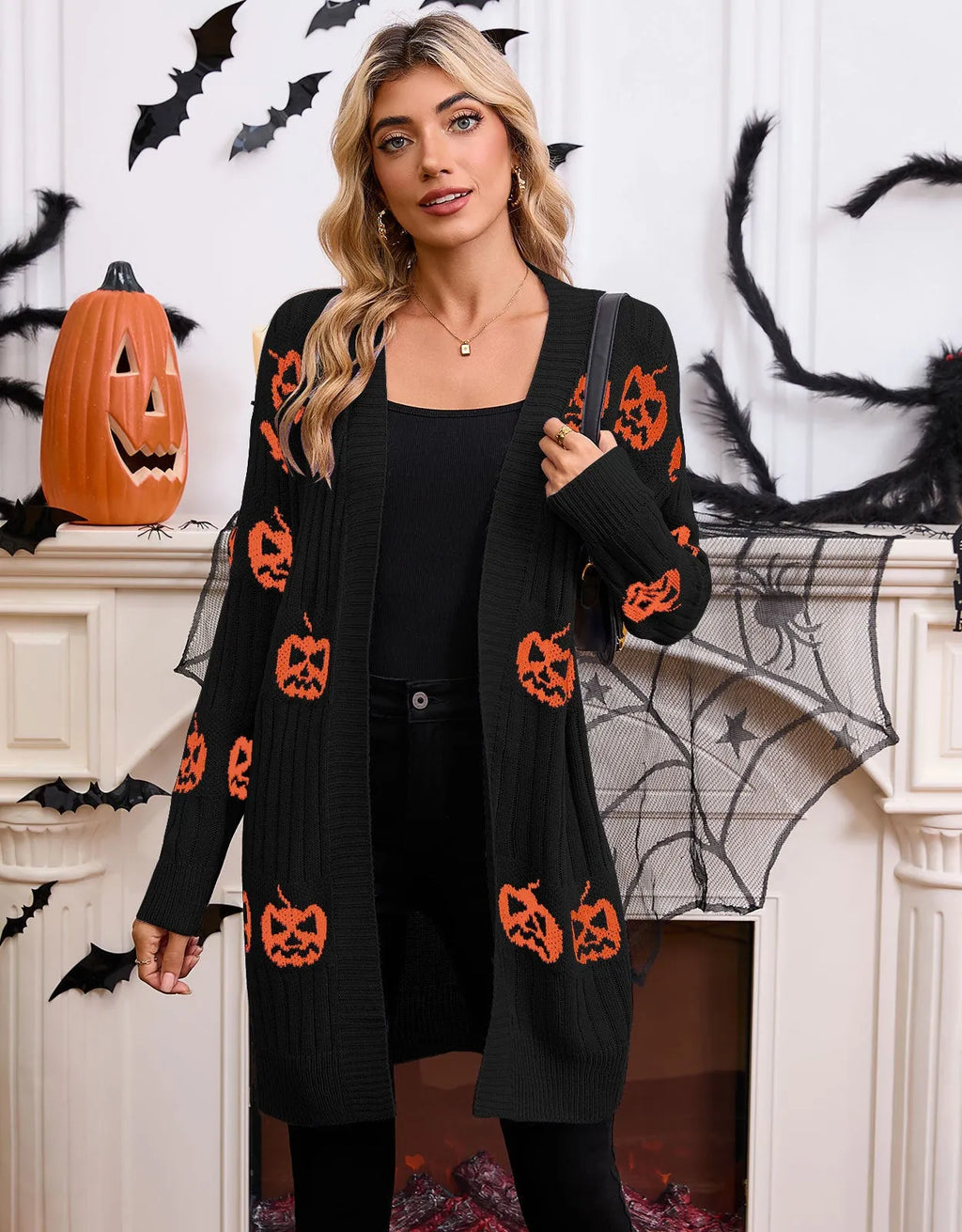 Women's black Halloween cardigan with orange pumpkin head jacquard knit pattern