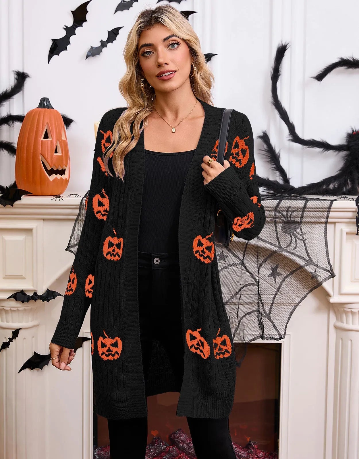 Women's black Halloween cardigan with orange pumpkin head jacquard knit pattern