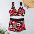 Two-piece female swimsuit set with printed boxer brief bottoms and sleeveless top