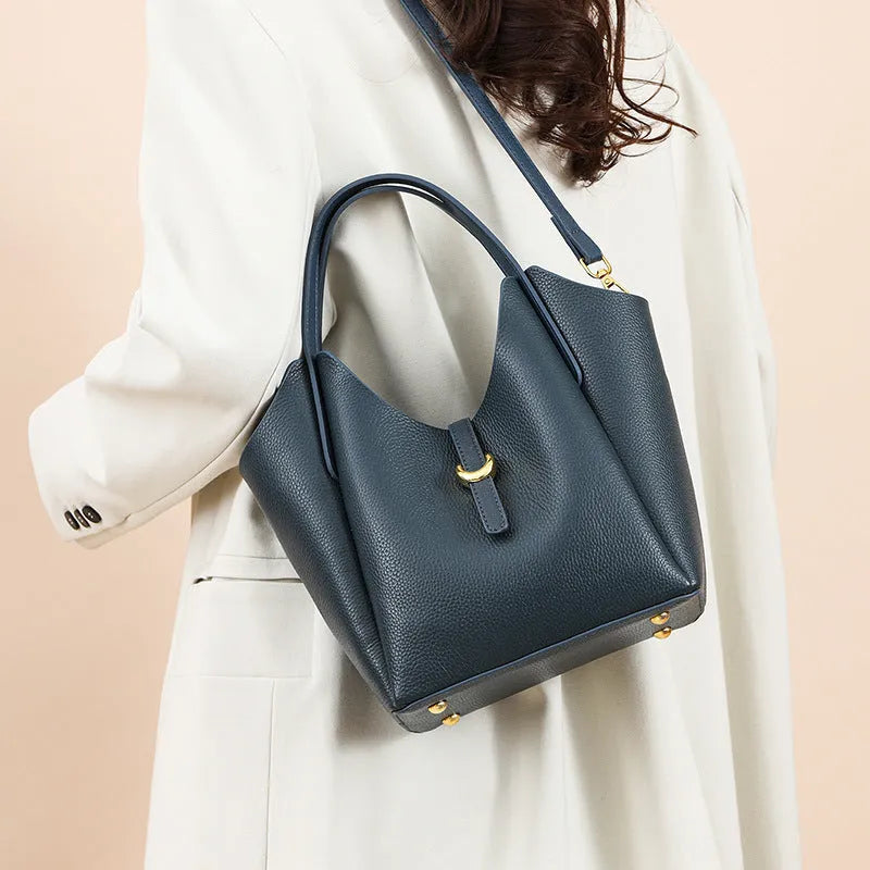 Genuine leather women's bucket bag with hand holding design in retro European American style