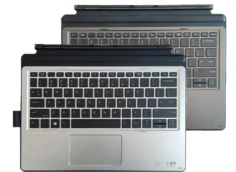Wireless Bluetooth keyboard acting as a base for an HP Elite X2 tablet, showing multimedia keys.