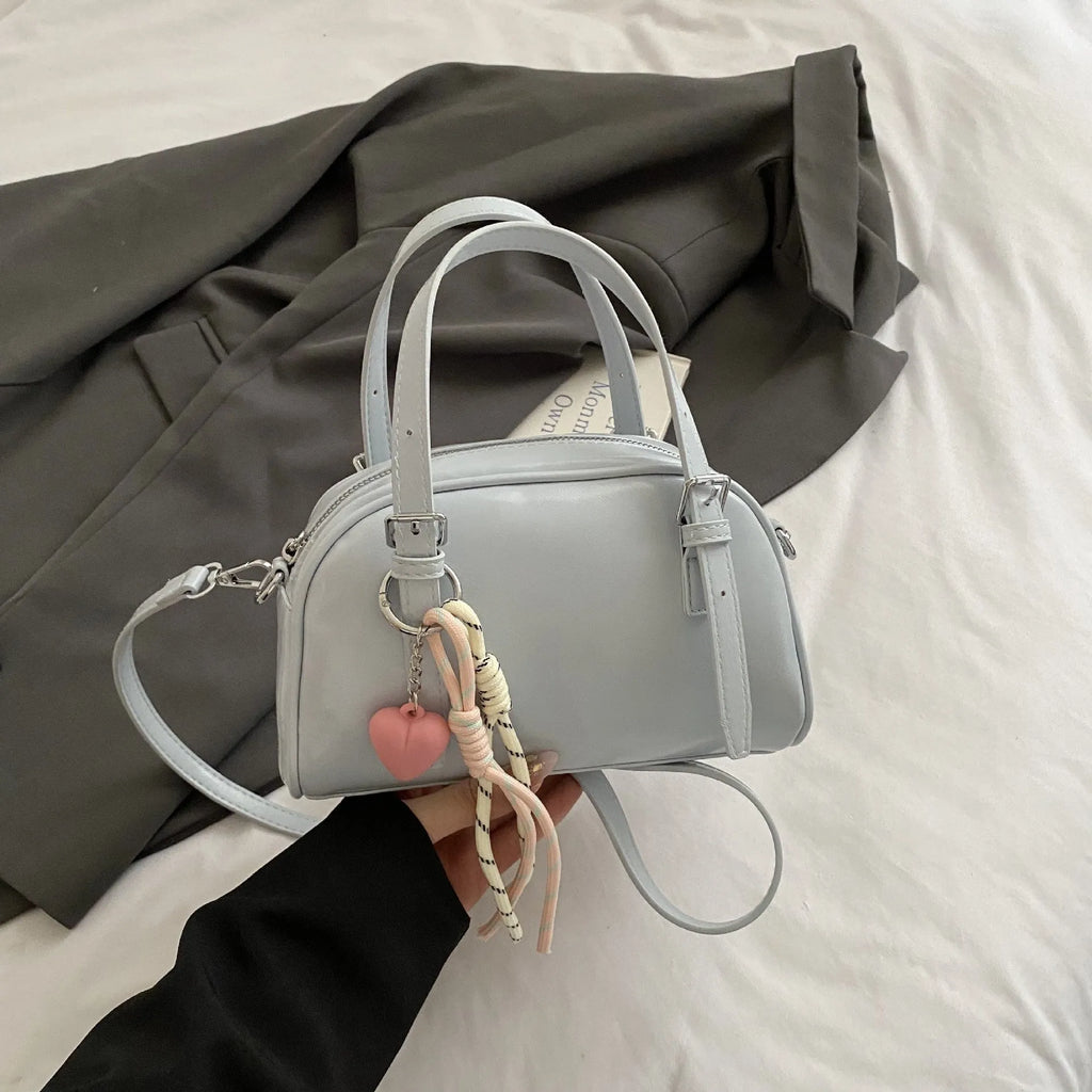 Korean-style square shell shoulder bag in soft PU leather with optional pendant decoration