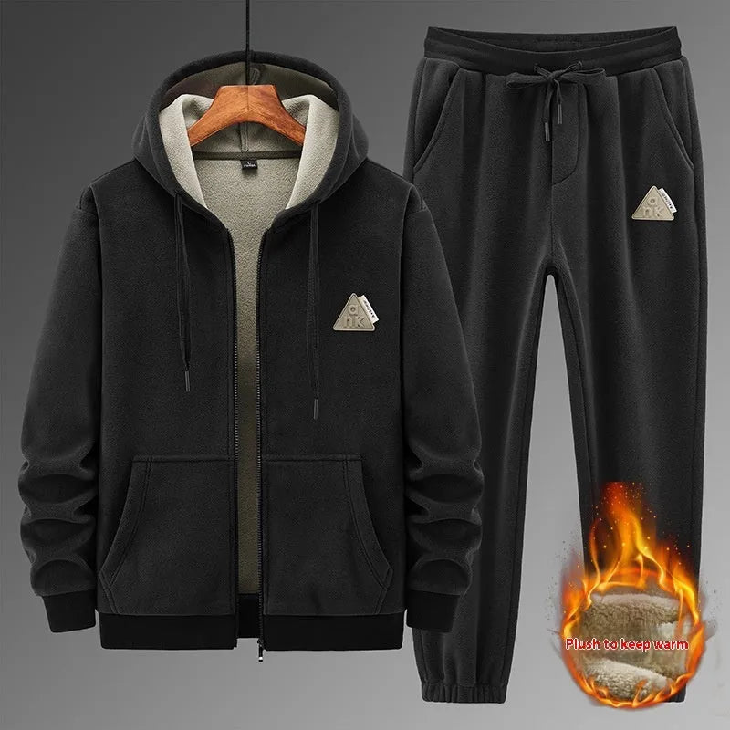 Men's grey cashmere hooded sweater and cotton pants casual sports suit set laid flat.