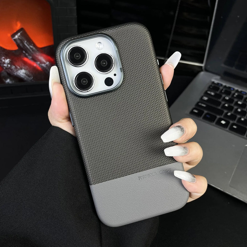 Black iPhone case with dragon scale texture and stitching design, showing magnetic ring on back.