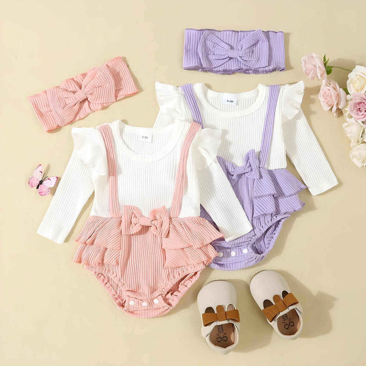 Baby girls cotton romper with flounced shoulder strap and long sleeves in pink, triangle jumpsuit style