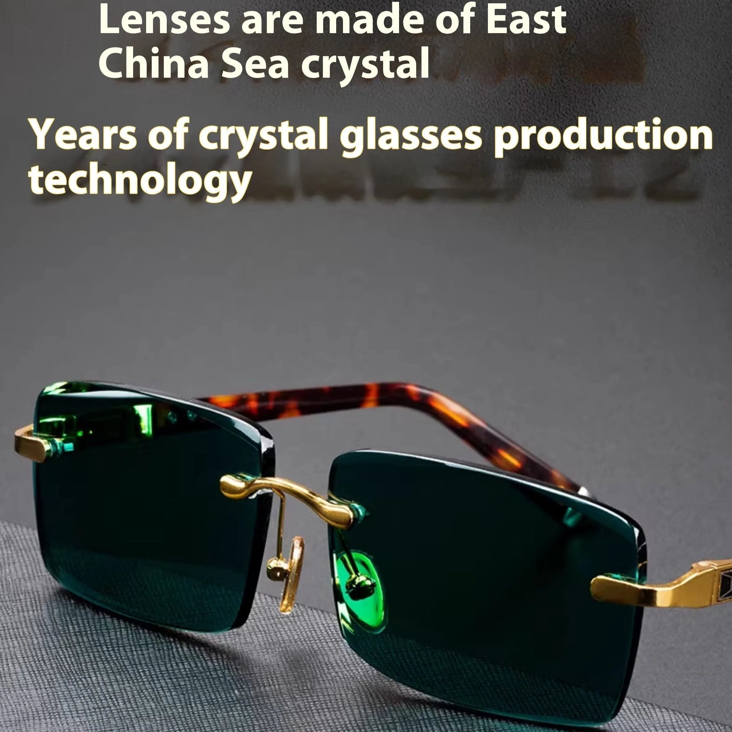 Frameless dark green crystal sunglasses with a glasses case and cleaning cloth.