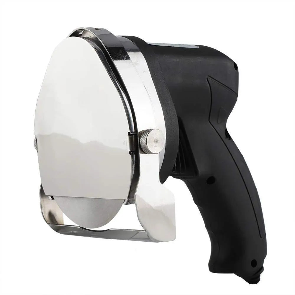 Black electric meat cleaver with 80W motor and EU plug on a work surface.