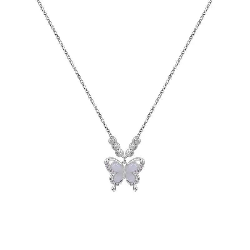 Silver necklace with square opal butterfly pendant on an adjustable cross chain.