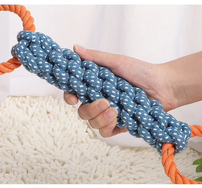 Blue double-ring braided cotton rope dog chew toy with bone shape and textured knots for dental cleaning