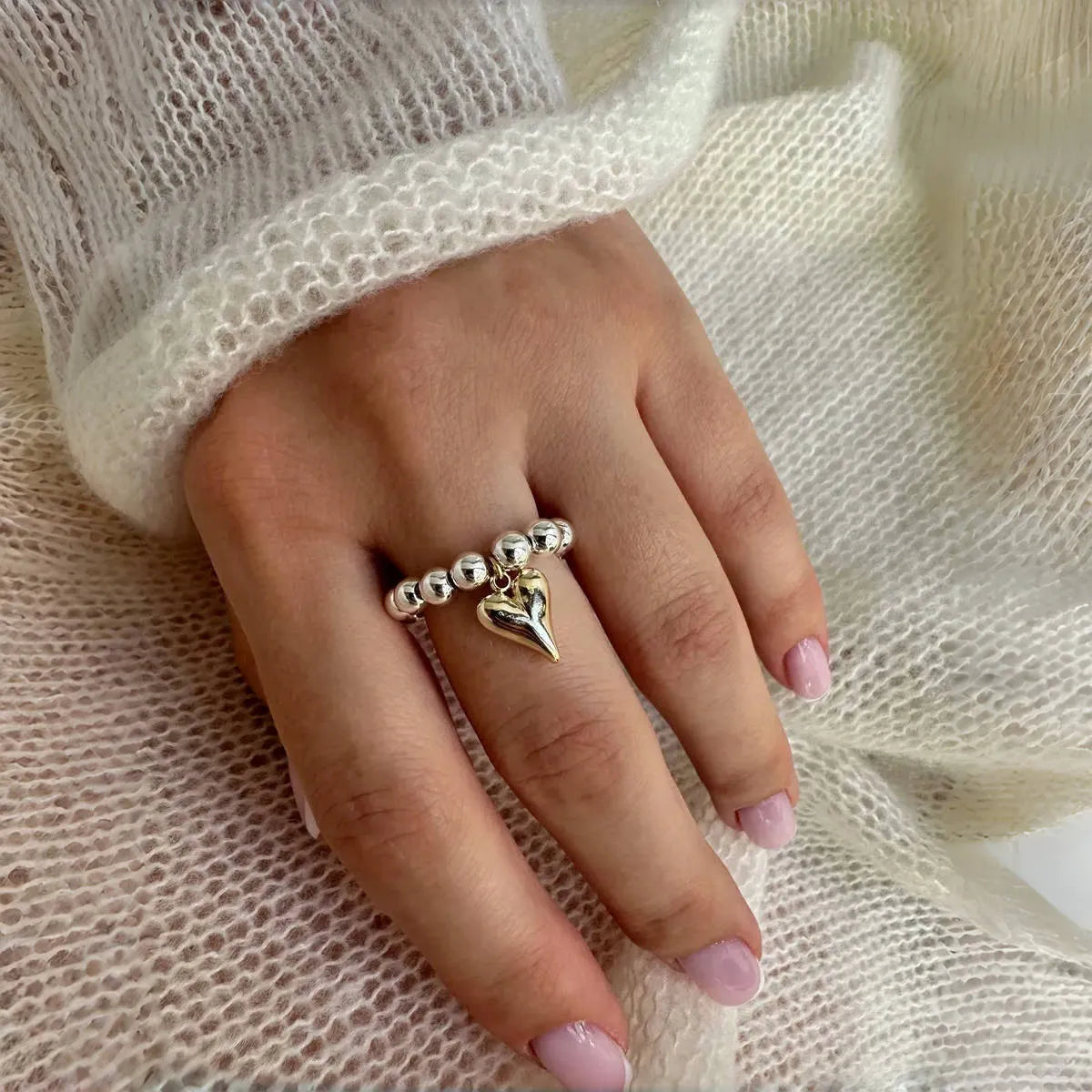 Handmade elastic beaded ring with love heart design in gold or white colour
