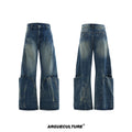 Man wearing verdant blue loose-fit retro jeans with a washed burst pattern.