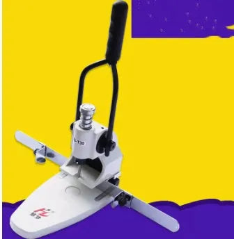 T30 single hole manual punching machine on a desk with paper stack inserted, adjustable edge guide visible
