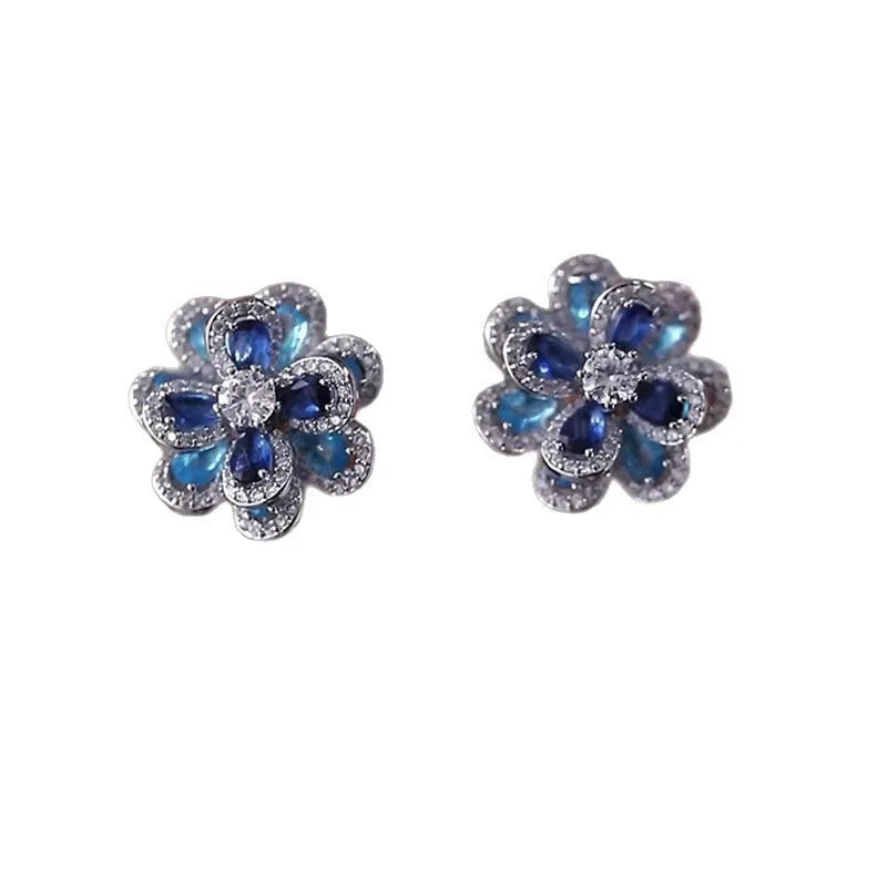 Blue flower stud earrings for women with shiny diamond detailing and zinc alloy electroplated construction