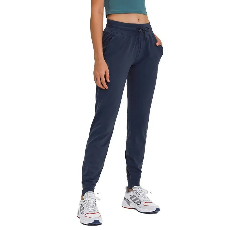 Women's high waist yoga pants with drawstring waistband in cotton blend quick-dry fabric