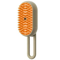 3-in-1 electric steam pet brush in milk brown with silicone bristles and ergonomic handle