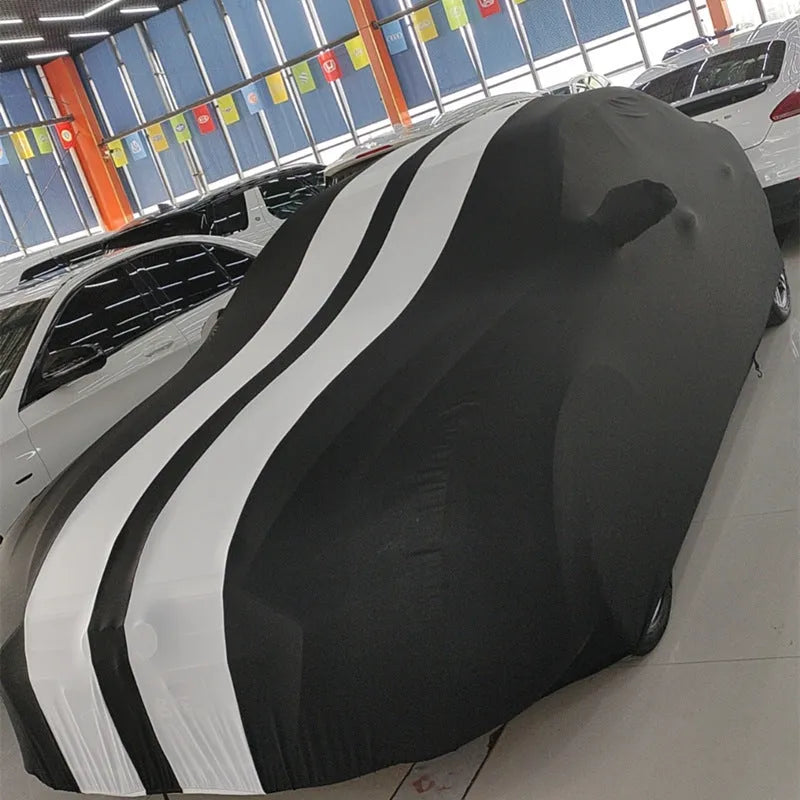 Ford Mustang elastic car cover in light grey colour stretched over vehicle showing four-side elastic edges