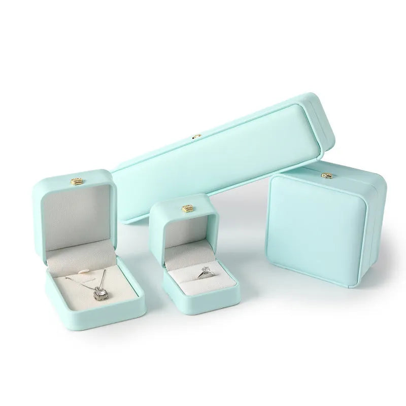 PU leather jewellery storage box in seven colours with ring, pendant, bracelet and necklace compartments