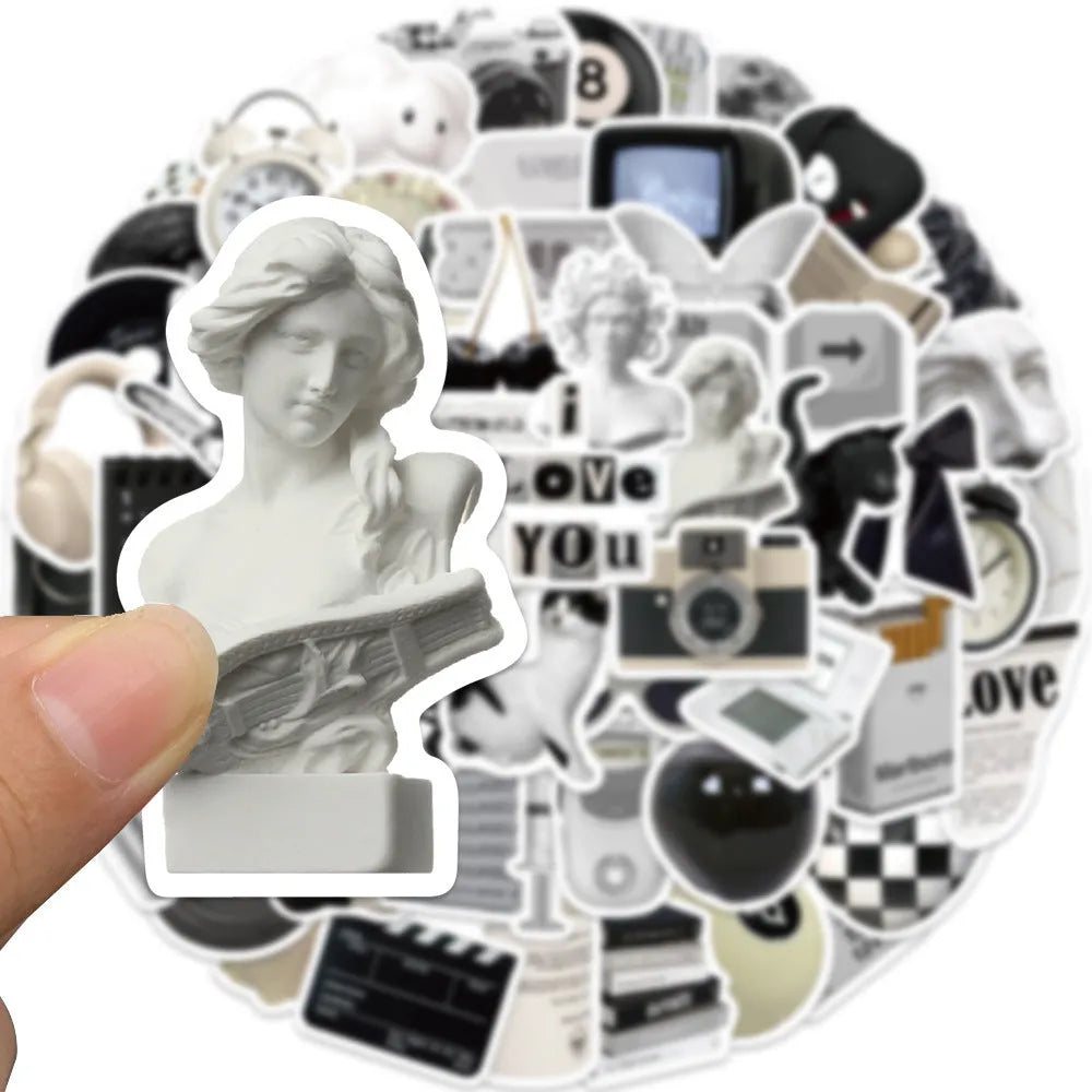 61 black and white waterproof PVC stickers for laptop and phone decoration.