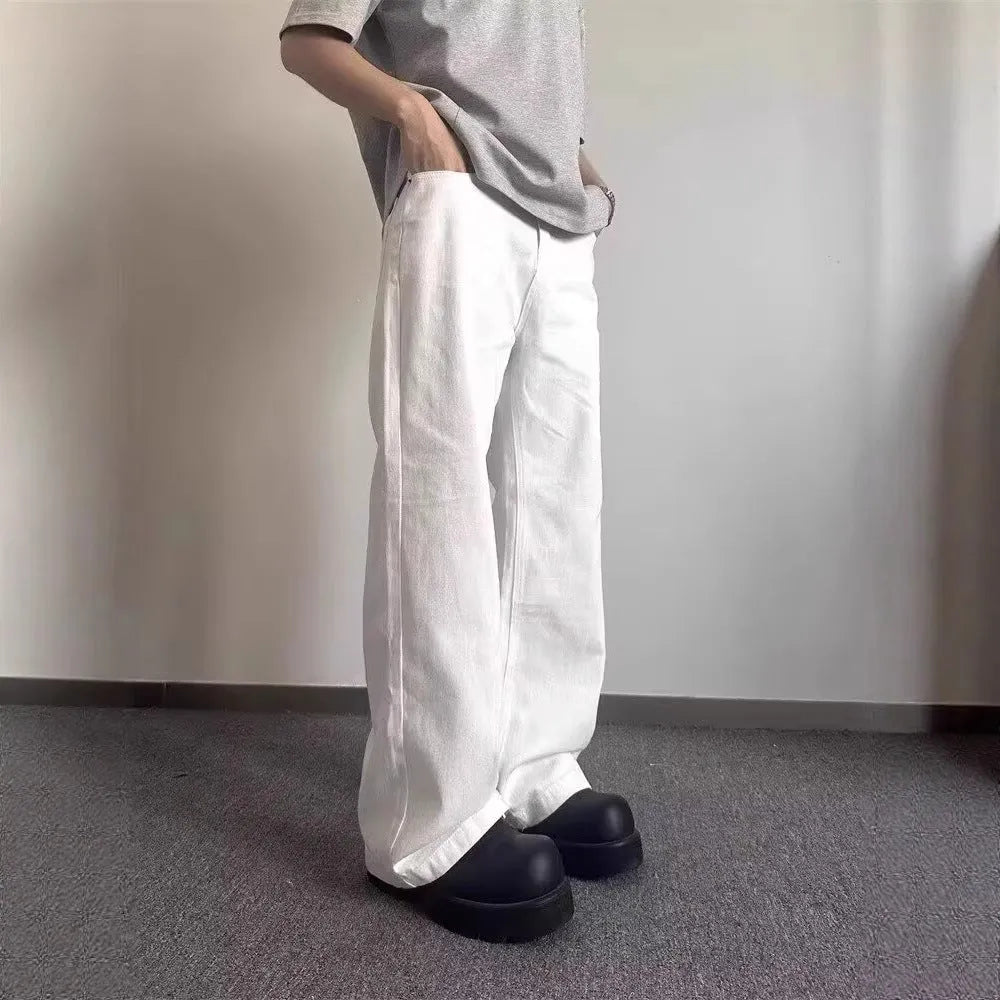 Men's white straight-leg wide-leg jeans on a mid-waist with a zipper fly