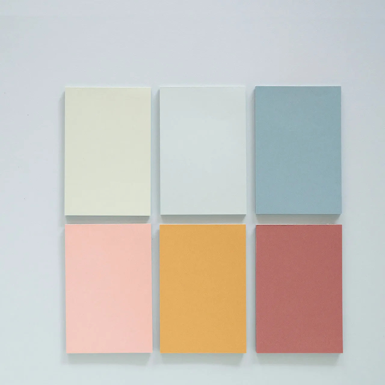 Pack of 150 coloured sticky notes in six colours, each measuring 12cm by 8cm.
