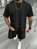 Men's short sleeve top and shorts suit in a printed polyester blend fabric.