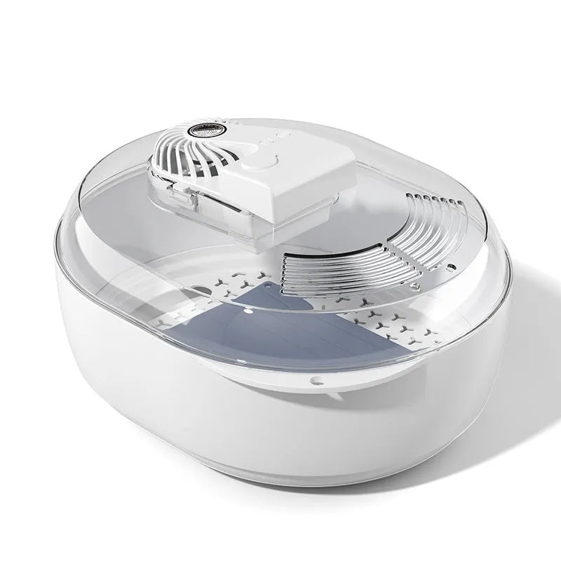 Aluminium household quick defrosting plate and separate USB cable on a kitchen counter.