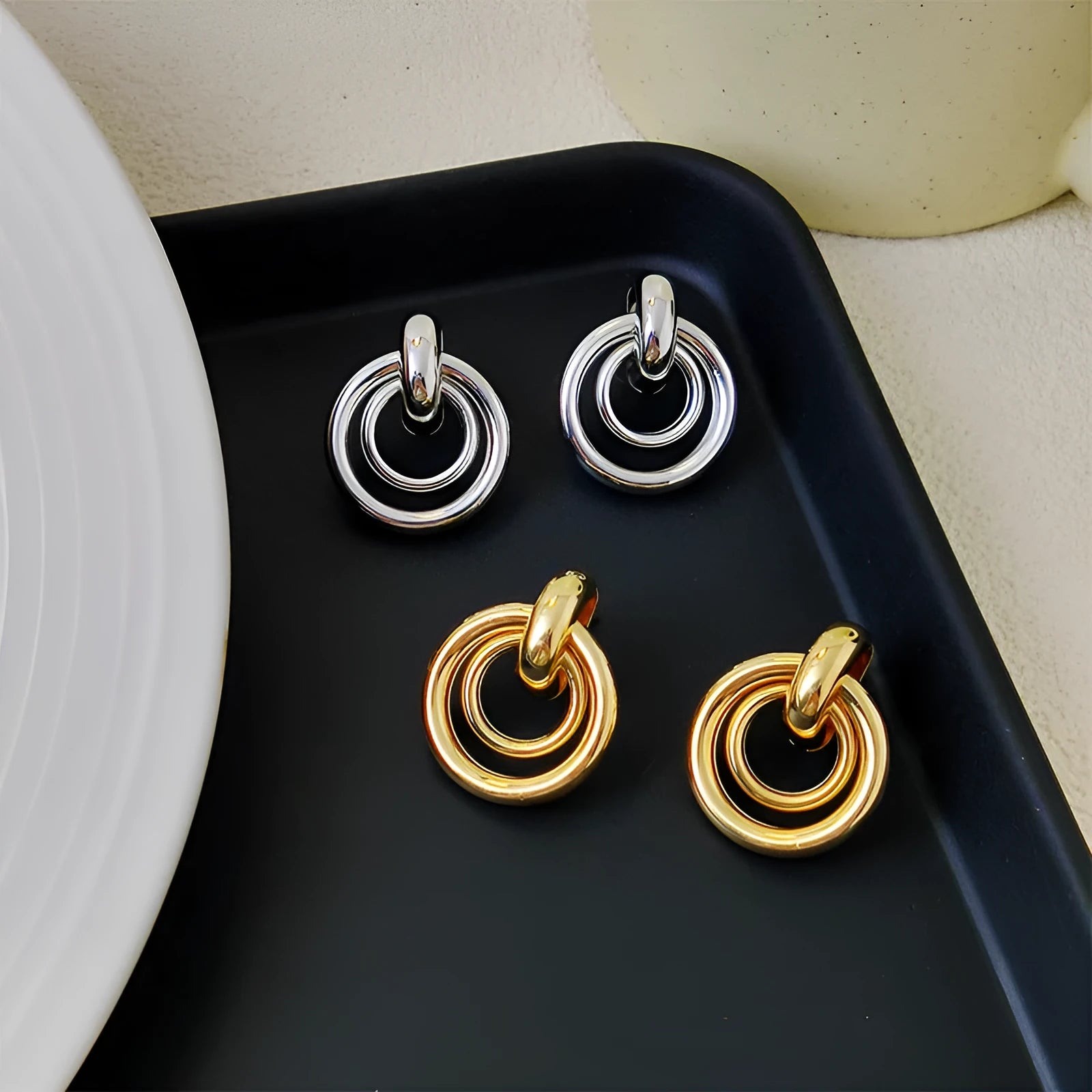 Geometric round ring earrings with irregular design in gold electroplated finish