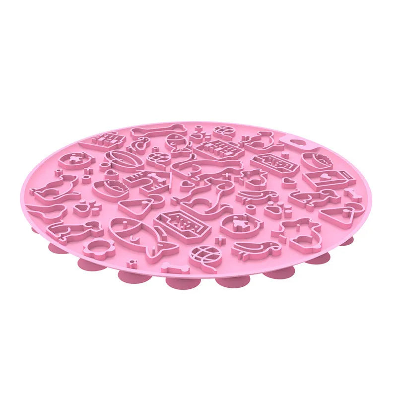 Round silicone pet licking mat with textured surface and a central suction cup, shown in mint green colour.