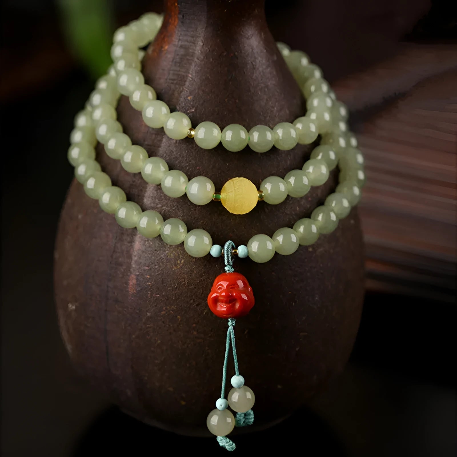 Pale blue Hetian jade bracelet with three circle design on wrist