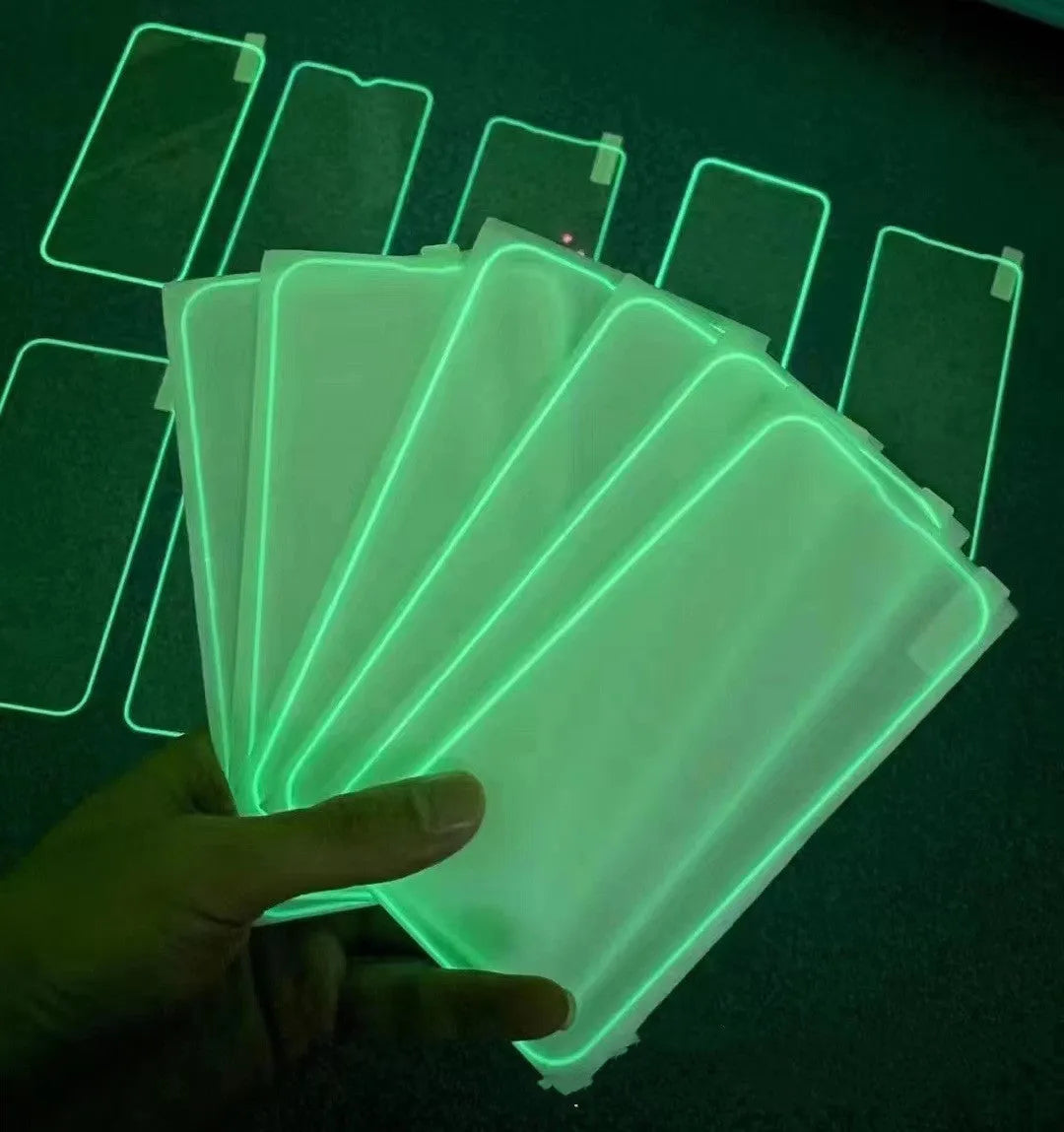 Fluorescent pink luminous tempered glass screen protector fitted on an iPhone.