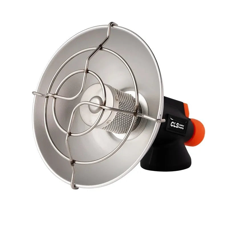 Black and orange portable outdoor gas heating stove with automatic ignition on a camping table.