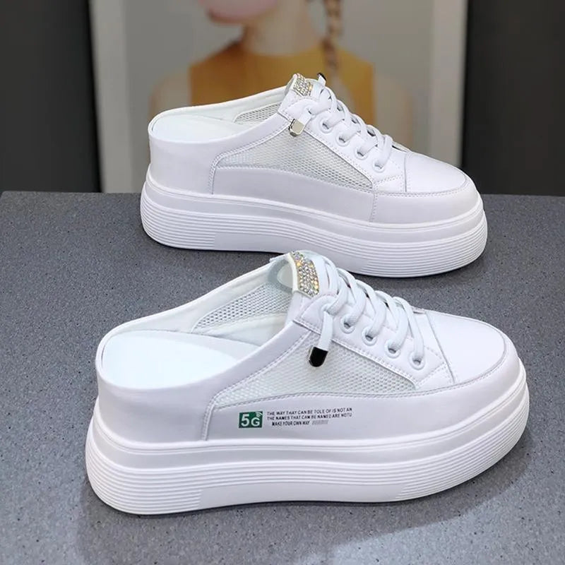 White women's platform shoes with mesh surface and heel-free design on rubber sole