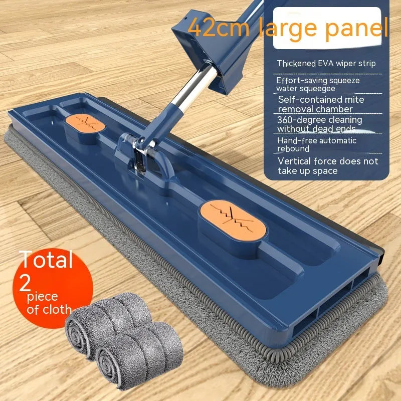 Large flat mop with long stainless steel handle and blue fine fibre mop cloth on a tiled floor