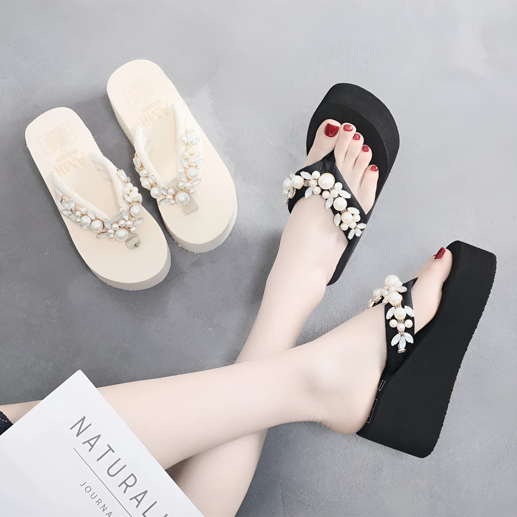 Women's beige high-heeled flip-flop sandals with cotton cloth upper on a light background.