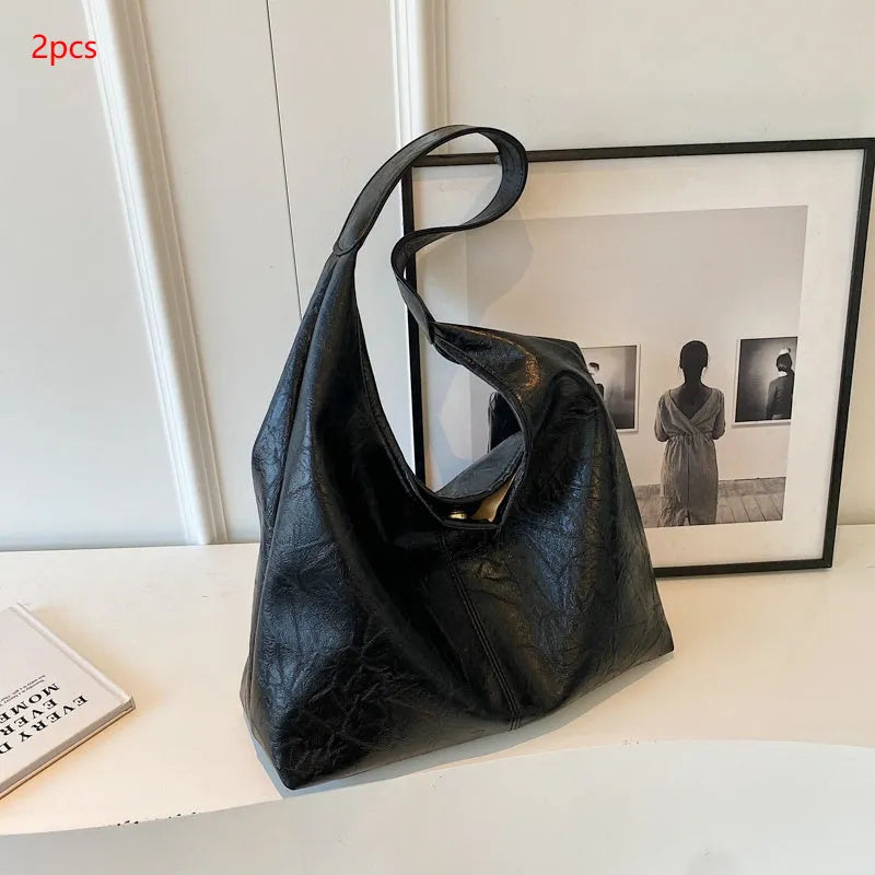 Soft leather shoulder bag with large capacity and sandwich pocket in street trend style