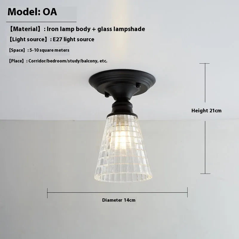 American retro style single-head ceiling or wall lamp with a glass cover.