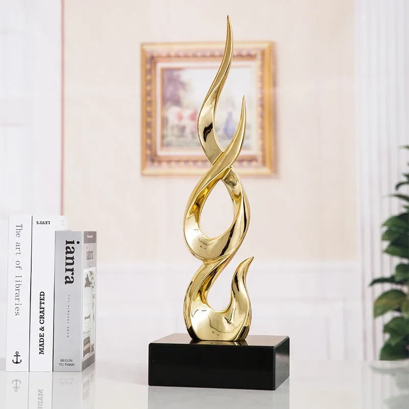 Resin high-rise festival decoration ornament in bright gold colour with modern simple styling